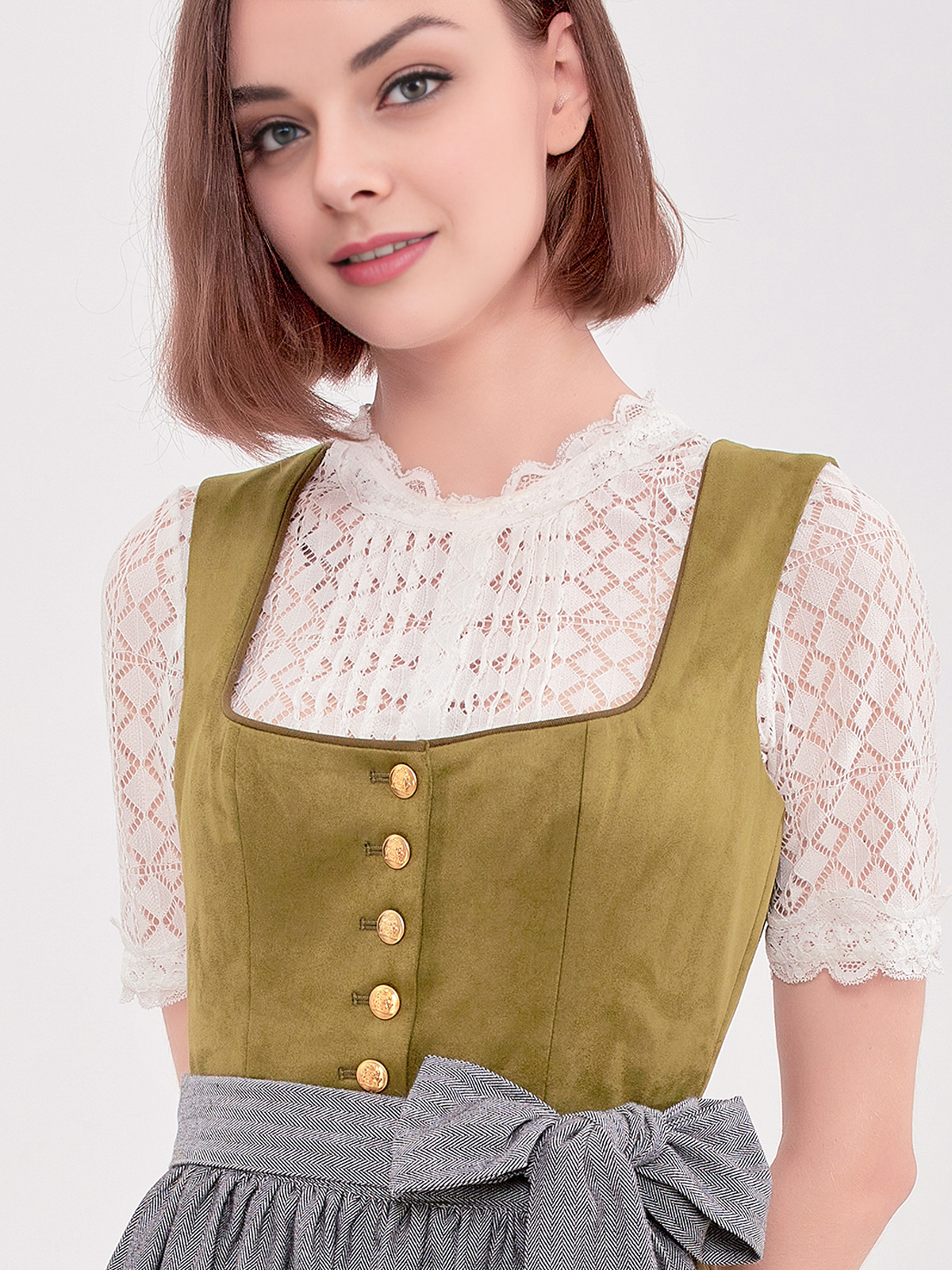 Modernes Dirndl in Grün mit taillenbetontem Schnitt